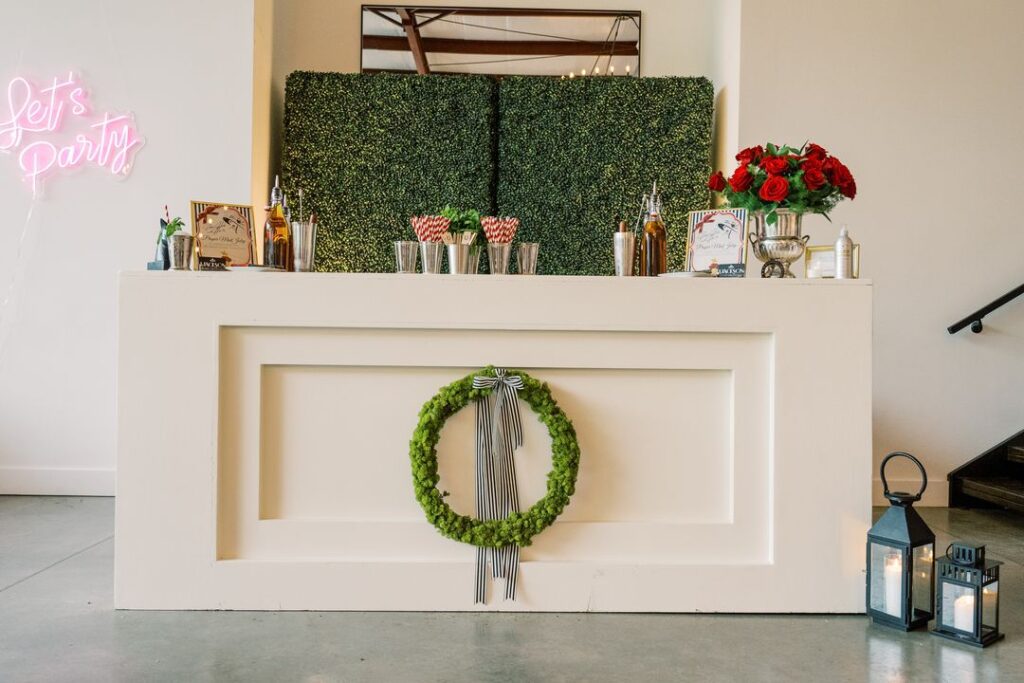 boxwood wall event bar backdrop