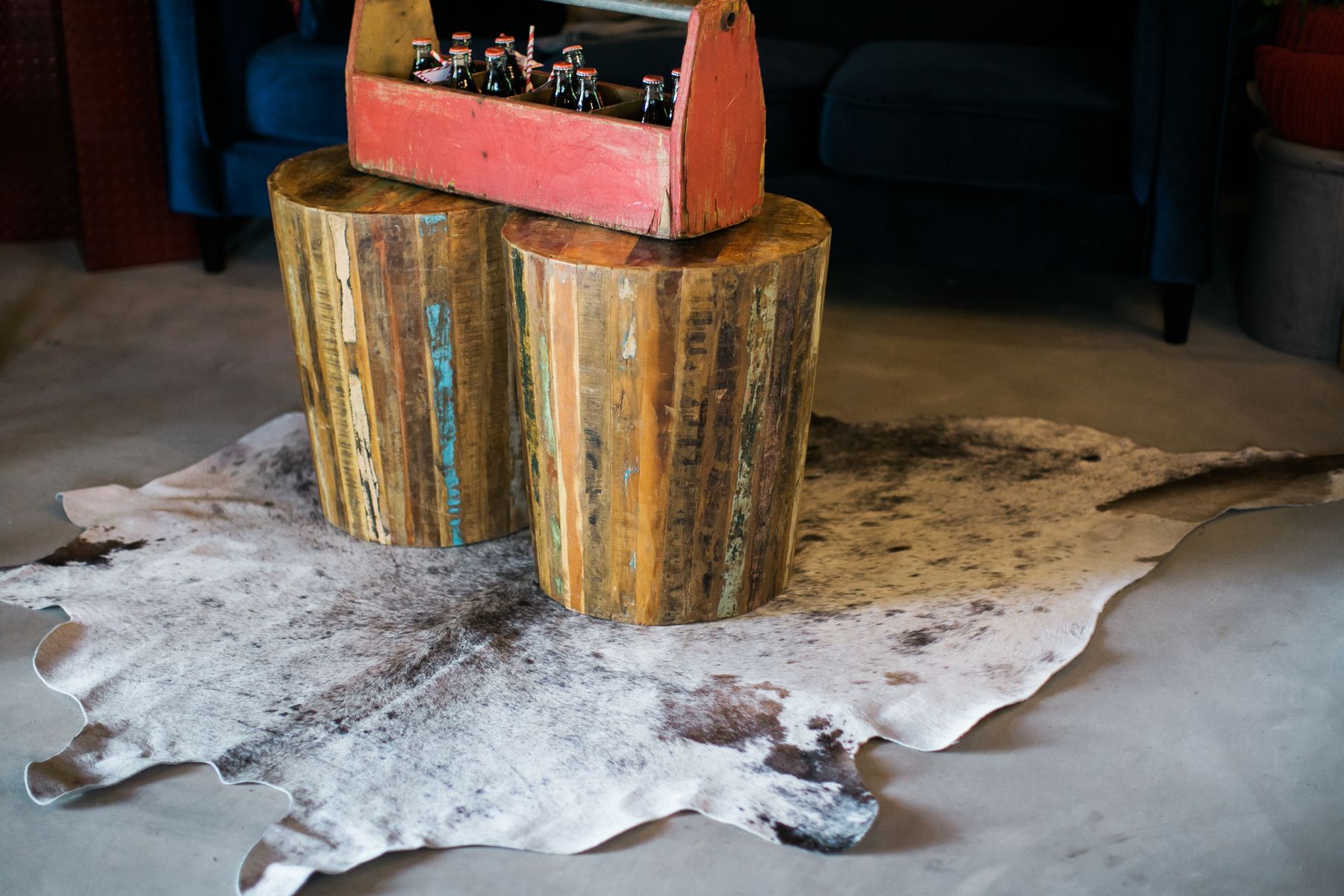 urban accent table and cowhide rug