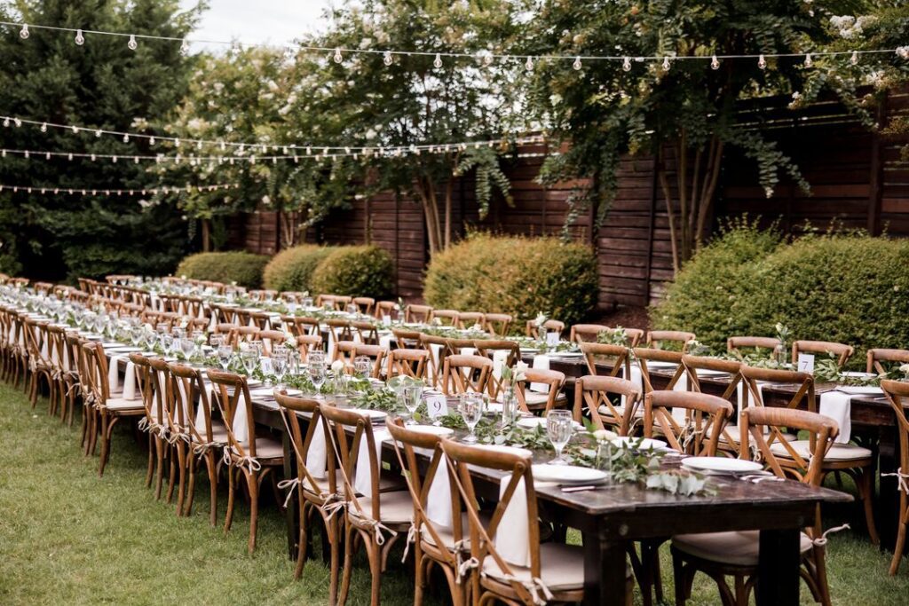 garden wedding reception, wood banquet tables