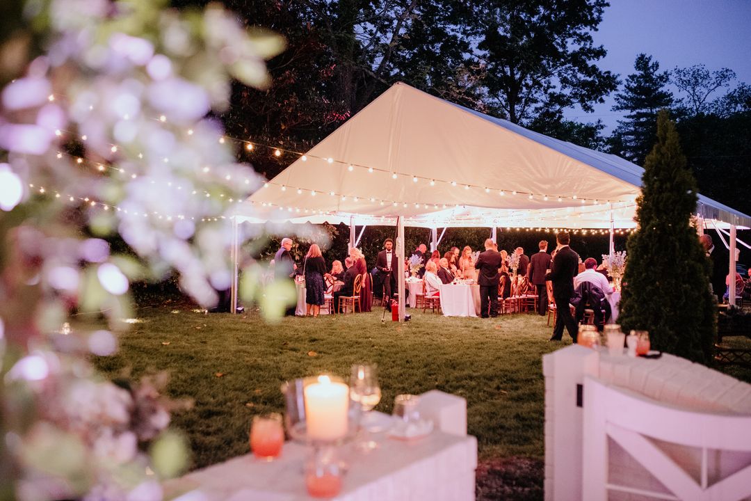 tented wedding at night