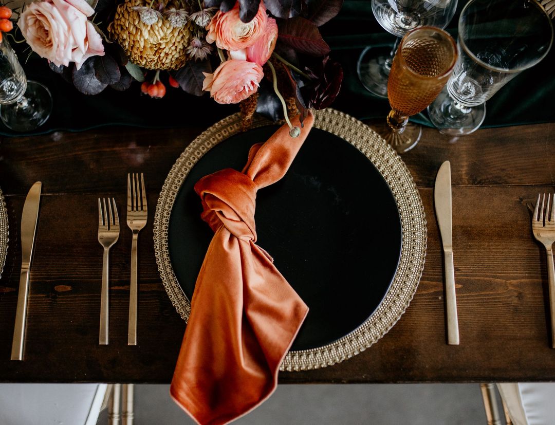 rust black and gold tablescape