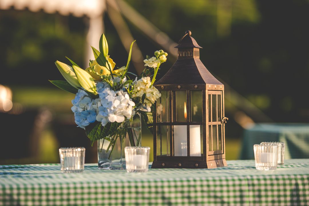 metal tabletop lanter and glass votives