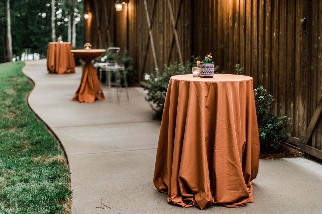 spice colored cocktail table linens for rent