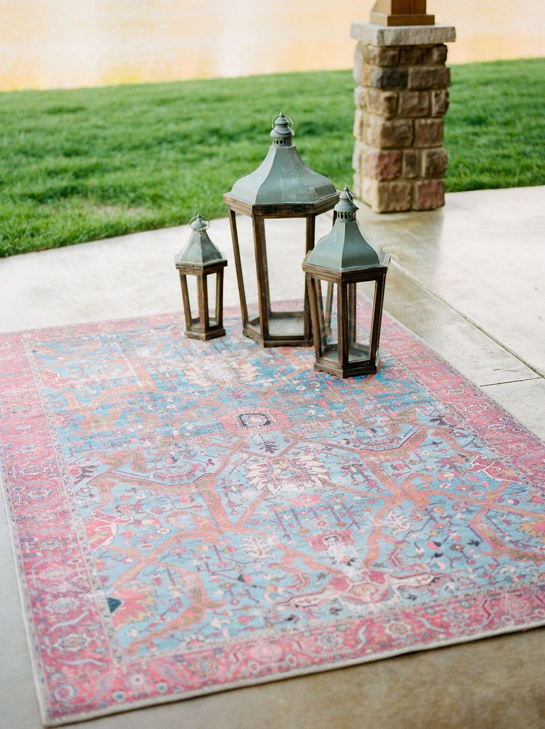 floor lanterns & red-blue rug