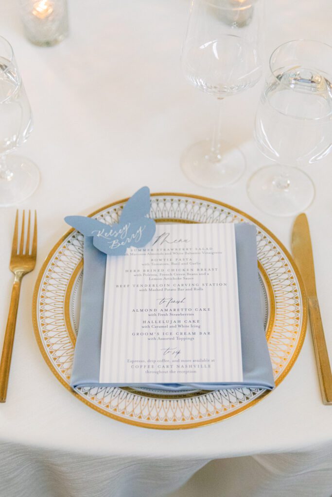 blue and gold wedding reception place setting