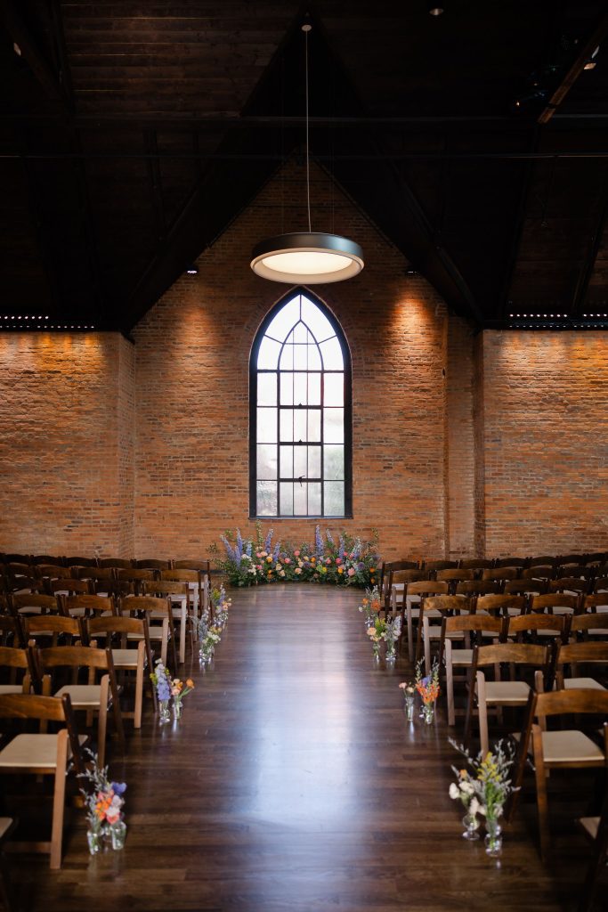 golden hour wedding ceremony seating, fruitwood folding chairs