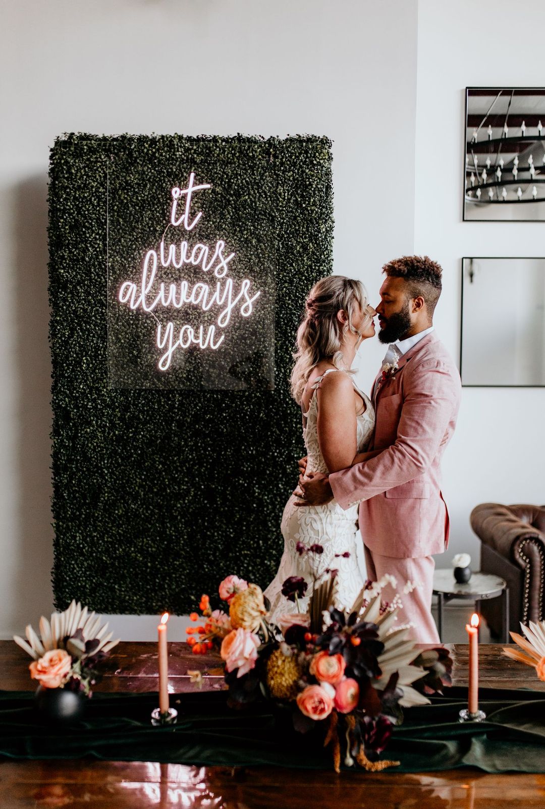 neon light and boxwood wall photo backdrop